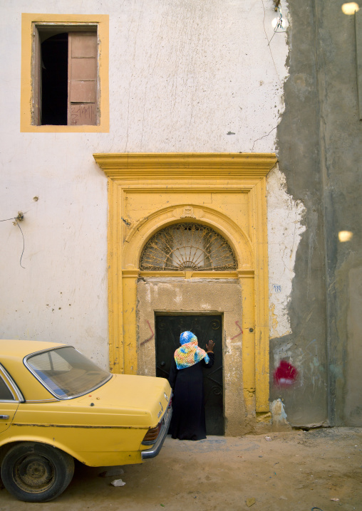 Yellow car parked in the medina in front a door, Tripolitania, Tripoli, Libya