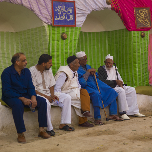 Men resting on a bench, Tripolitania, Ghadames, Libya