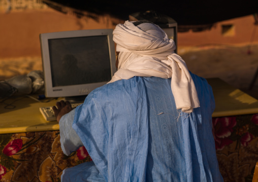 Tuareg man using a computer, Tripolitania, Ghadames, Libya