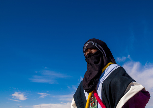 Portrait of a tuareg man  in traditional clothing against the sky, Tripolitania, Ghadames, Libya