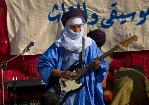 Tuareg man playing guitar, Tripolitania, Ghadames, Libya
