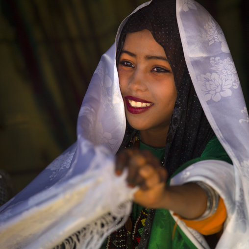 Smiling tuareg girl in traditionnal clothing, Tripolitania, Ghadames, Libya