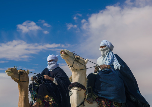 Tuareg men riding camels, Tripolitania, Ghadames, Libya