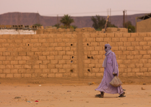 Tuareg man walking in the street, Tripolitania, Ghadames, Libya