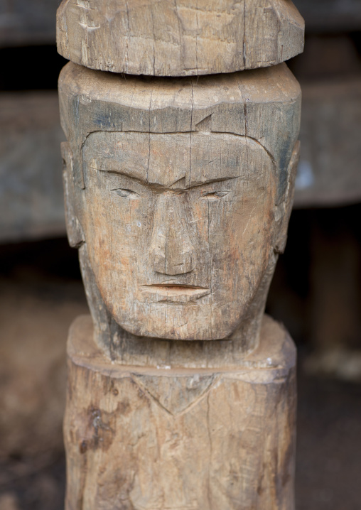 Alak common house statue pillar, Boloven, Laos