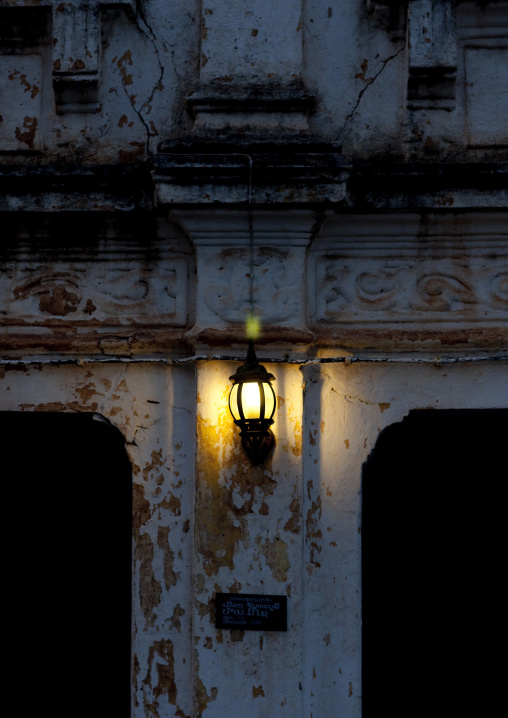 Lamp on a colonial building, Vientiane, Laos