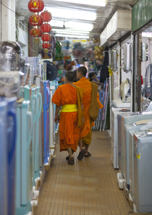 Monks inside an electronic shop, Vientiane, Laos