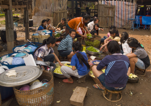 Women preparing meal for festivities, Louang namtha, Laos