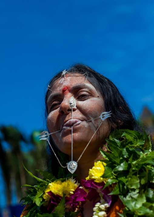 Hindu Devotee Woman With Pierced Tongue During Annual Thaipusam Religious Festival In Batu Caves, Southeast Asia, Kuala Lumpur, Malaysia