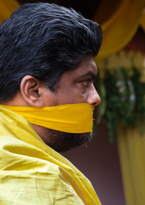 Hindu Devotee With Her Mouth Gagged To Keep Silence In Annual Thaipusam Religious Festival In Batu Caves, Southeast Asia, Kuala Lumpur, Malaysia