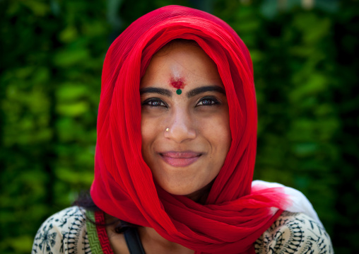 Portrait Of A Woman With Red Scarf In Batu Caves In Annual Thaipusam Religious Festival, Southeast Asia, Kuala Lumpur, Malaysia