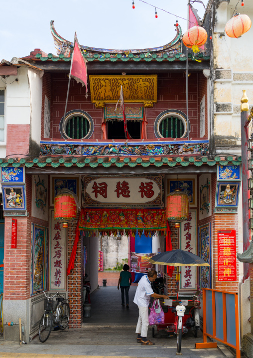 Rickshaw In Front Of An Old Chinese Temple, Penang Island, George Town, Malaysia