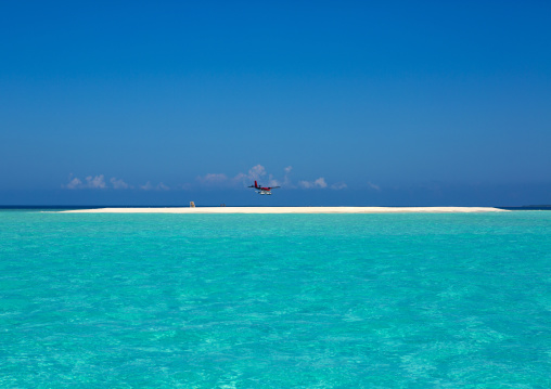 Seaplane Arriving At Soneva Fushi Hotel, Baa Atoll, Maldives