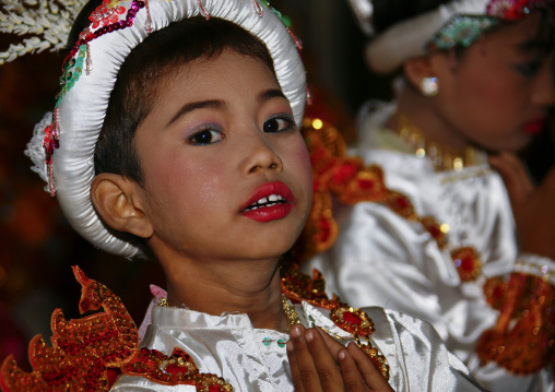 Young Girls During A Buddhist Ceremony In Mandalay, Myanmar