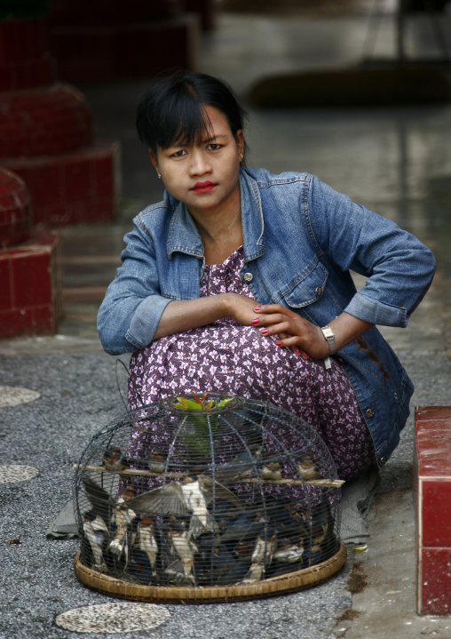 Woman With Thanaka Selling Birds, Mandalay, Myanmar
