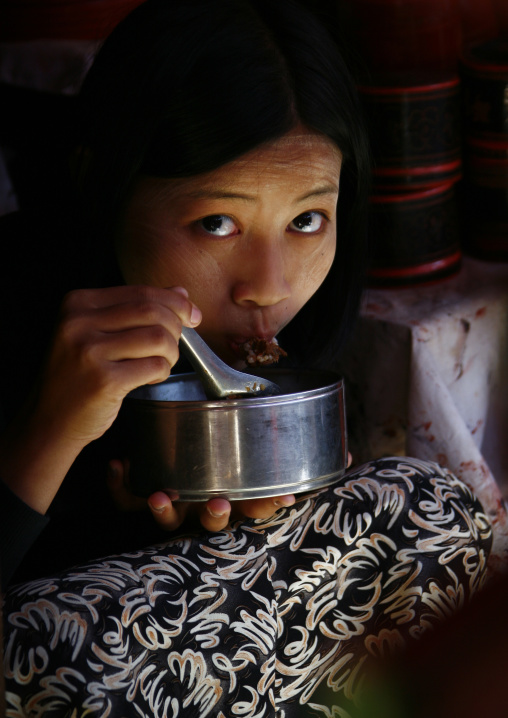 Woman Eating In Bagan, Myanmar