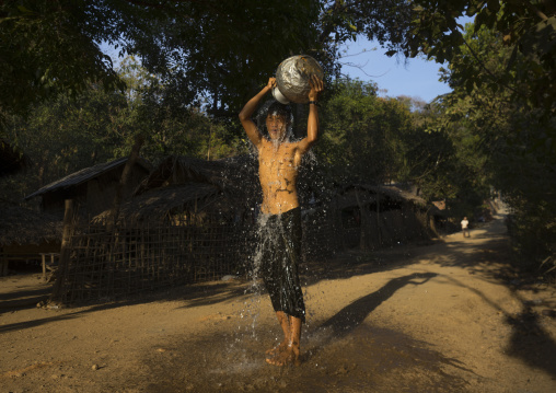 Man Washing Himself In The Street, Mrauk U, Myanmar