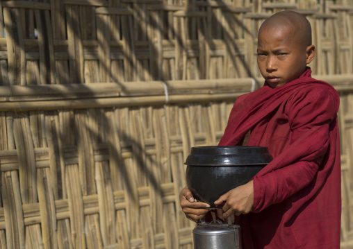 Novice Monk Begging For Food On A Road, Mrauk U, Myanmar
