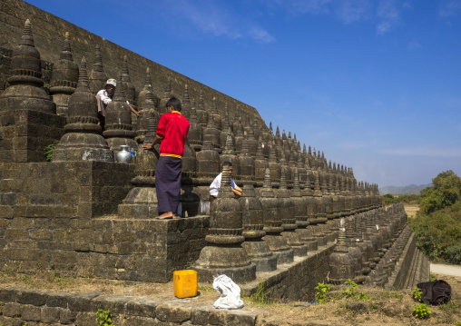 Men Restoring Stupas At Kothaung Temple, Mrauk U, Myanmar