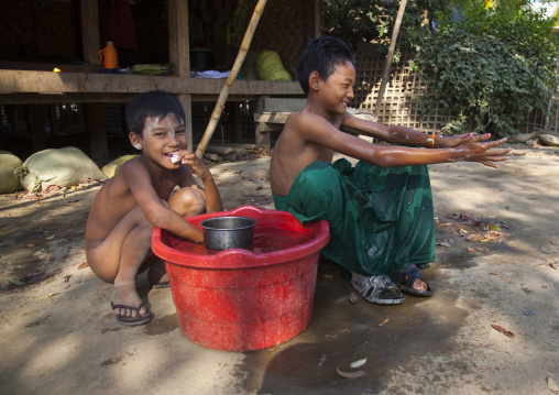 Rohingya Children Having A Bath, Thandwe, Myanmar