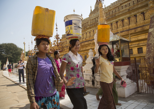 Workers Passing In Front Of Shwe Zigon Paya Golden Temple, Bagab, Myanmar