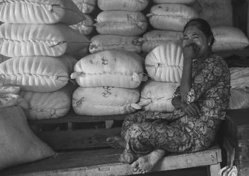 Women Sit In Front Of Bags In A Market, Ngapali, Myanmar