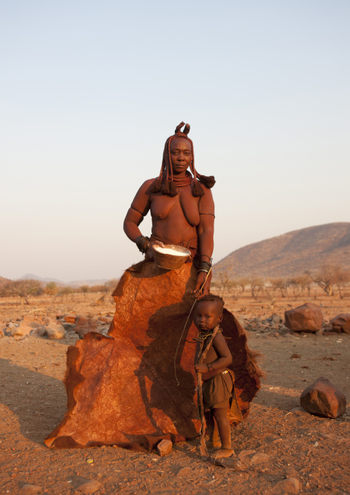 Himba Child In Front Of A Skin Holding His Mother S Hand, Okapale Area, Namibia