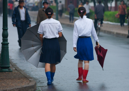 North Korean girls in the street during a rainy day, North Hwanghae Province, Sariwon, North Korea
