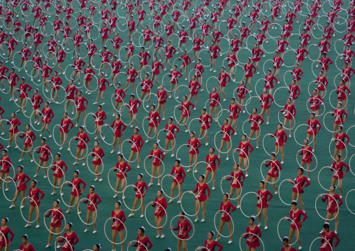 North Korean gymnasts performing with hoops during Arirang mass games in may day stadium, Pyongan Province, Pyongyang, North Korea