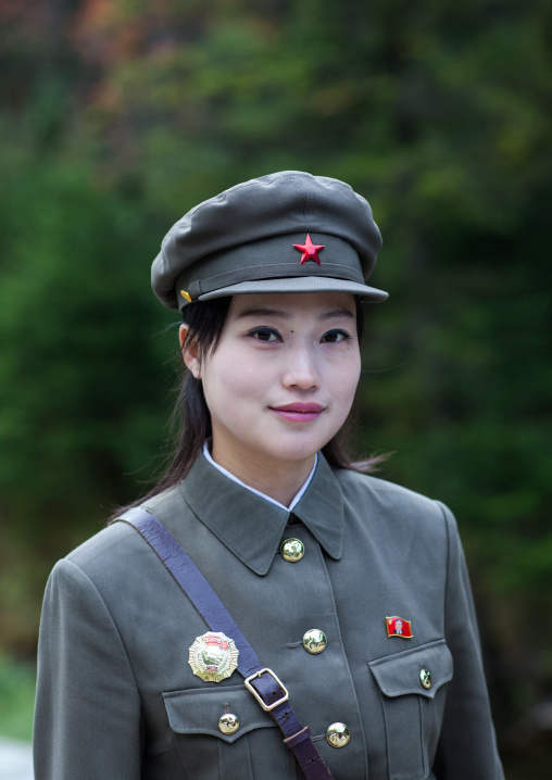 Portrait of a cute North Korean guide in military style uniform, Ryanggang Province, Chongbong, North Korea