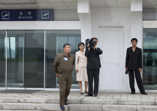 North Korean television crew in the arrival door of Sunan international airport waiting for a vip, Pyongan Province, Pyongyang, North Korea