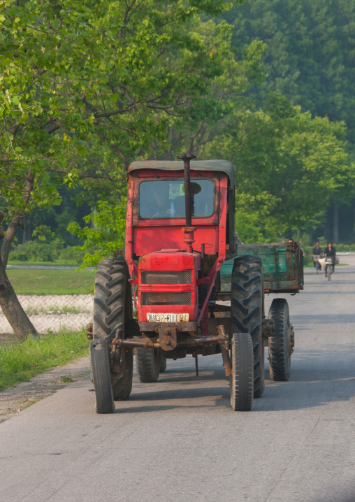 Old North Korean tractor on the road in the countryside, North Hwanghae Province, Kaesong, North Korea