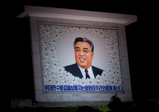 Smiling Kim il Sung on a propaganda fresco saying the great leader comrade Kim il Sung will always be with our people, Pyongan Province, Pyongyang, North Korea