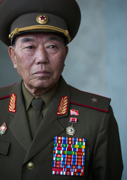 Portrait of a North Korean war veteran called general Pak Shan Su wearing medals, Pyongan Province, Pyongyang, North Korea