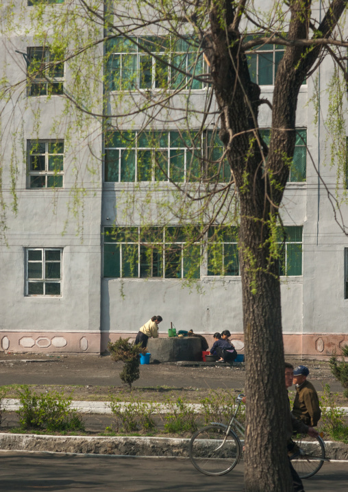 North Korean women taking water from a well in the city center, Kangwon Province, Wonsan, North Korea