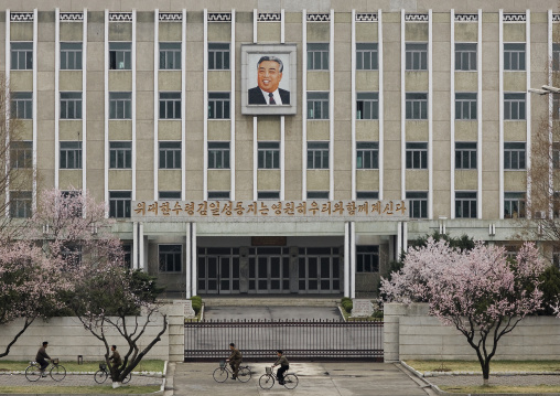 Public building with the smiling portrait of Kim il Sung, Pyongan Province, Pyongyang, North Korea