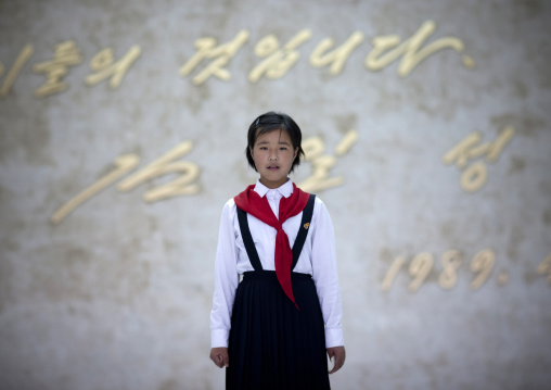 North Korean pioneer girl in the Mangyongdae children's palace, Pyongan Province, Pyongyang, North Korea