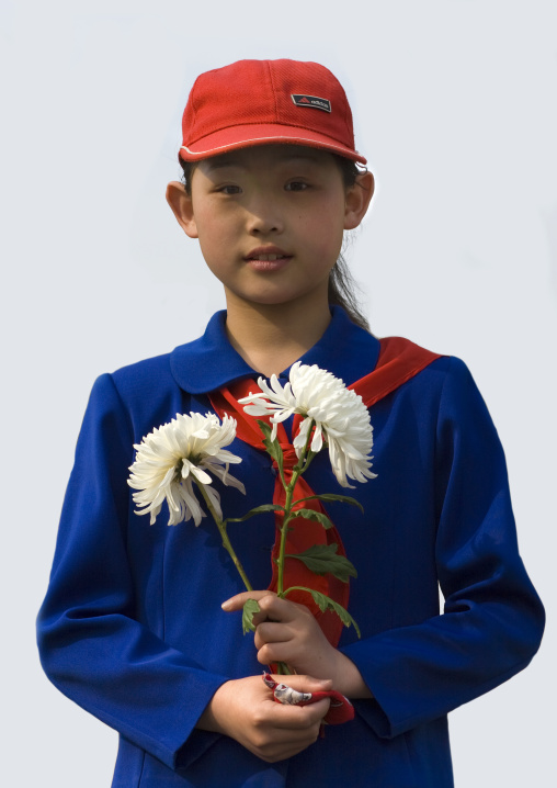 Young North Korean pioneer girl with flowers, Pyongan Province, Pyongyang, North Korea