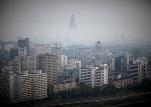 Foggy view across Taedong river from Yanggakdo hotel towards city centre, Pyongan Province, Pyongyang, North Korea