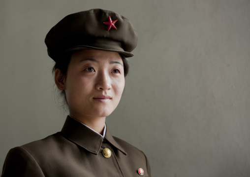 Portrait of a North Korean woman soldier with a cap, Pyongan Province, Pyongyang, North Korea