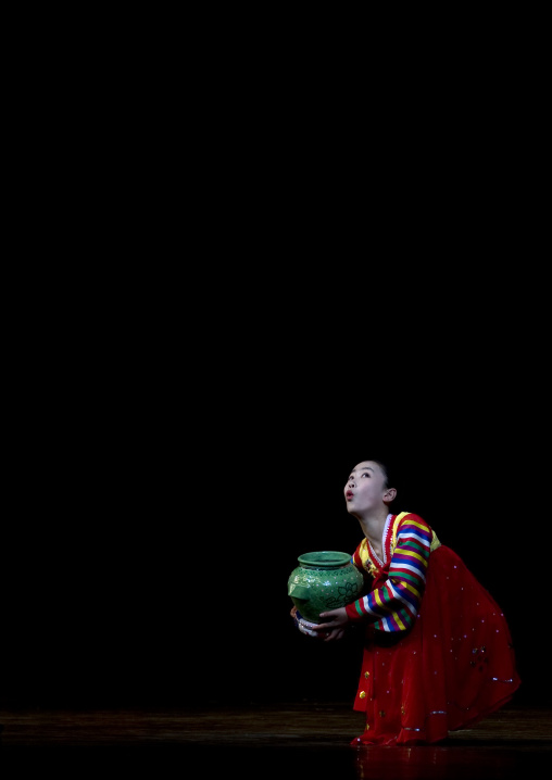 North Korean acrobat girl with a pottery on the stage of Mangyongdae children's palace, Pyongan Province, Pyongyang, North Korea