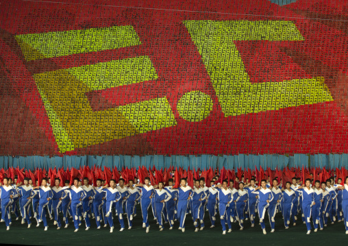 Anti capitalism human fresco made by children pixels holding up colored boards during Arirang mass games in may day stadium, Pyongan Province, Pyongyang, North Korea