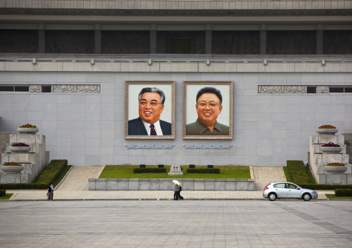 Kim il Sung and Kim Jong il giant portraits on Kim il Sung square, Pyongan Province, Pyongyang, North Korea
