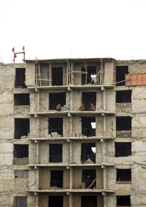 North Korean soldiers working as construction workers in a building, Pyongan Province, Pyongyang, North Korea