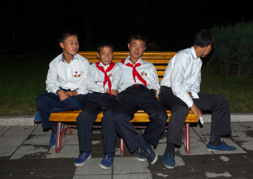 North Korean pioneers in Kaeson youth park at night, Pyongan Province, Pyongyang, North Korea