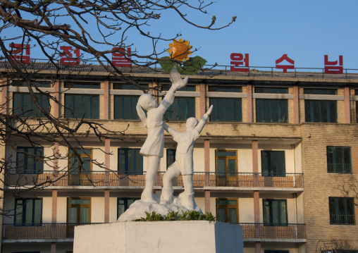 Statues of children and dove in the sunset in Tchang Gwang school kindergarden, North Hamgyong Province, Chongjin, North Korea
