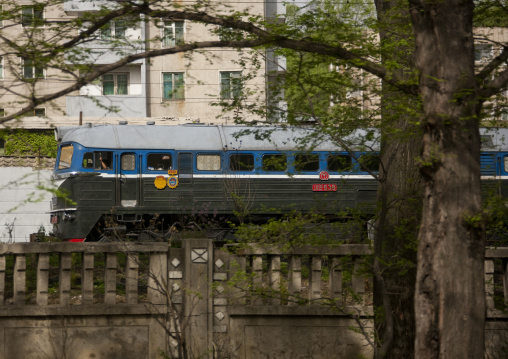 North Korean train passing in the city, Pyongan Province, Pyongyang, North Korea