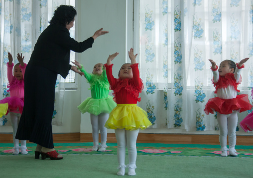 North Korean ballet dancers children in Kim Jong suk school with their teacher, Pyongan Province, Pyongyang, North Korea