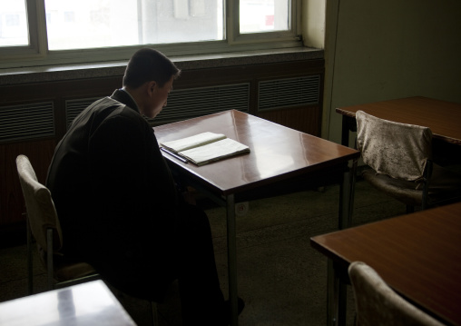 North Korean student reading at Grand people's study house, Pyongan Province, Pyongyang, North Korea