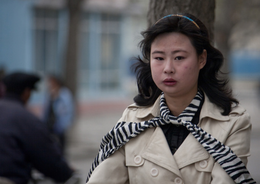 North Korean woman in western clothes in the street
, North Hwanghae Province, Kaesong, North Korea